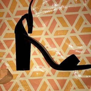 I’m selling these high heels. The high heels brand is Brash. The color is black.